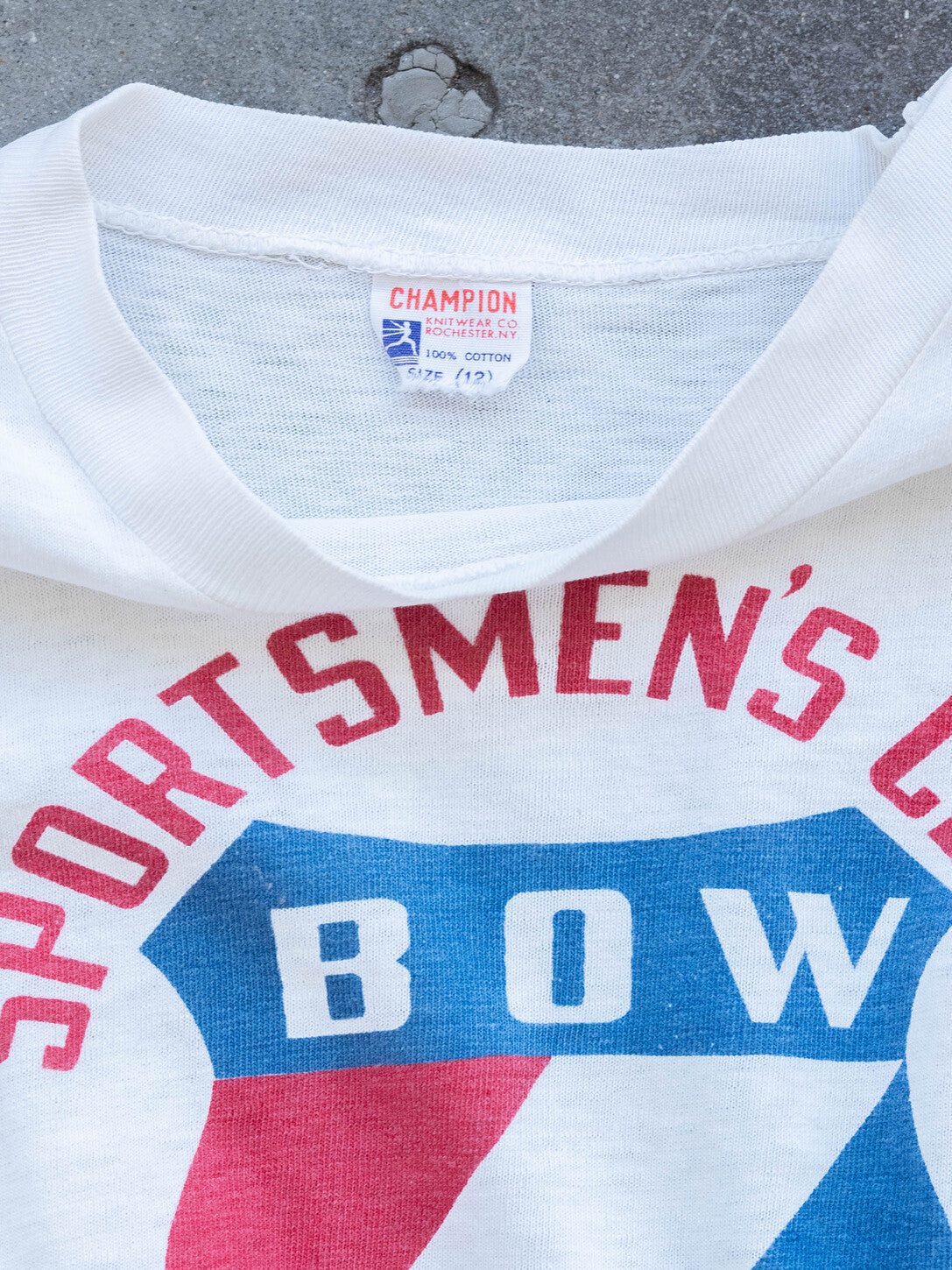 1950’s Champion Running Man Sportsmen’s Club Baby Tee