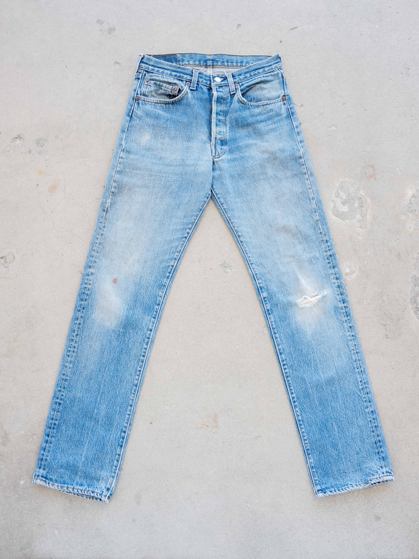 1980’s Levi’s 501 in a Midwash with Knee Rip 31W