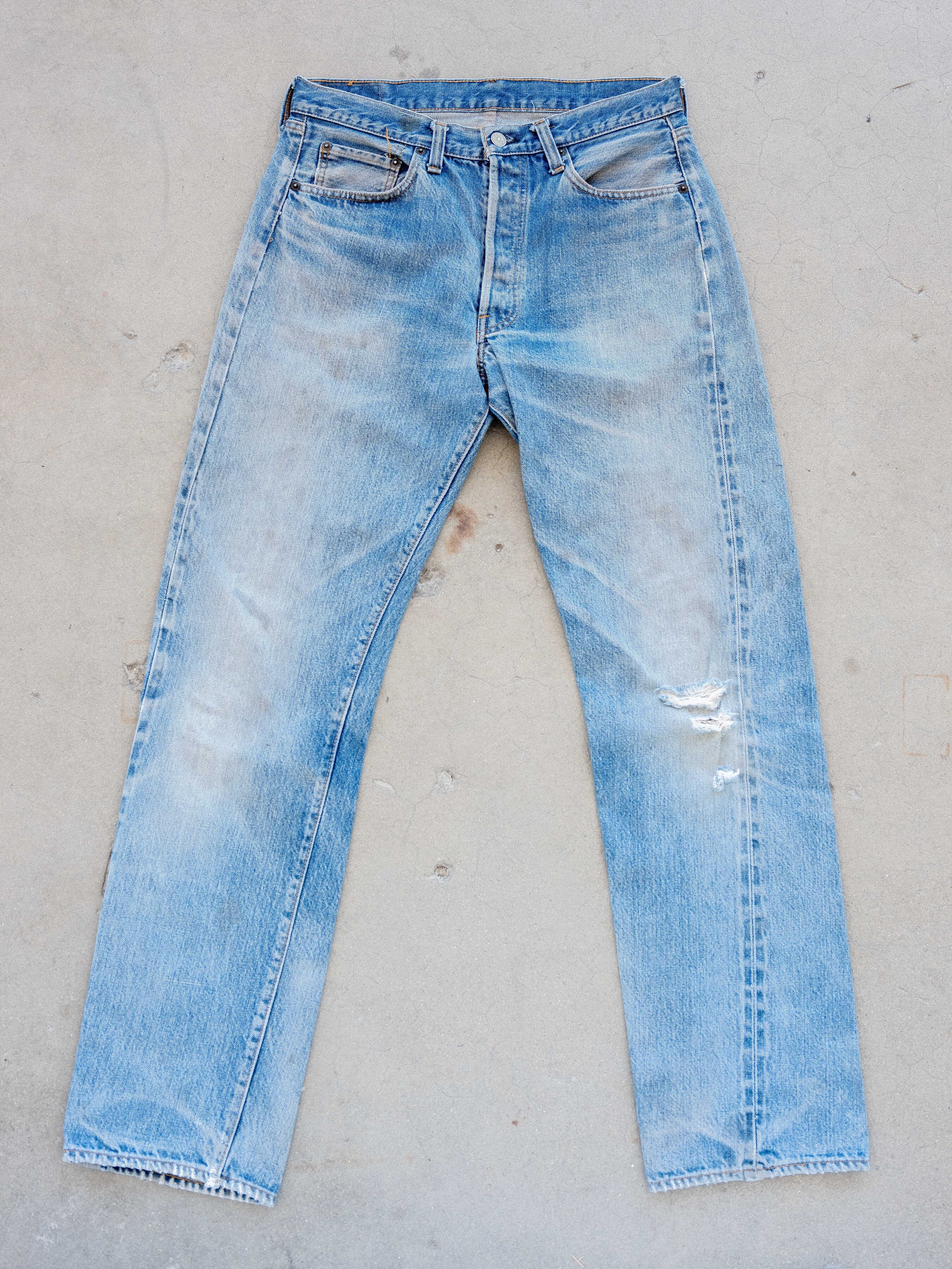 1980's Levi's 501 Redlines in a Light Midwash with Dirt and Rips