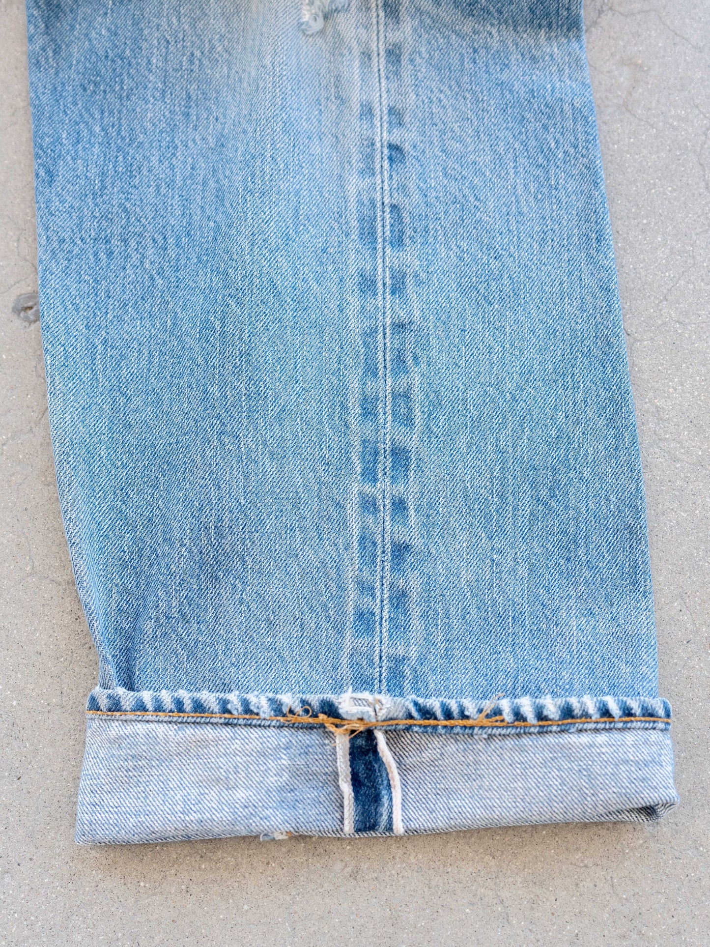 1980’s Levi’s 501 Redlines in a Light Midwash with Dirt and Rips 32W