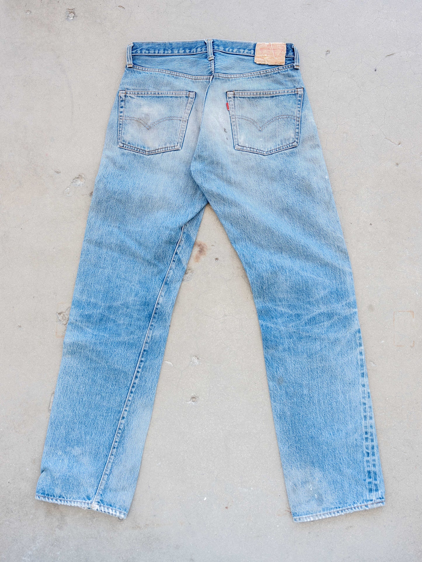 1980’s Levi’s 501 Redlines in a Light Midwash with Dirt and Rips 32W