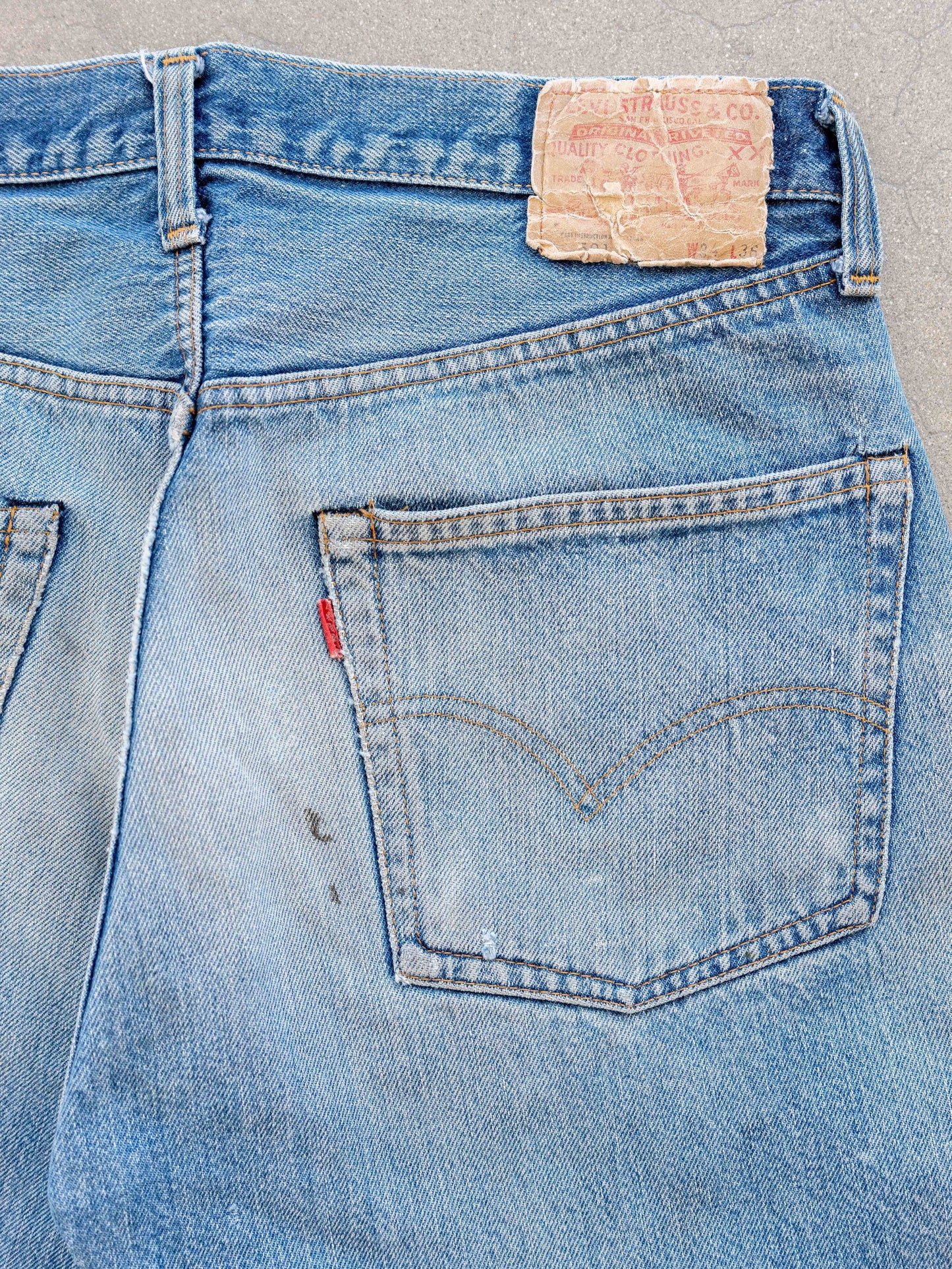 1980’s Levi’s 501 Redlines in a Light Midwash with Dirt and Rips 32W