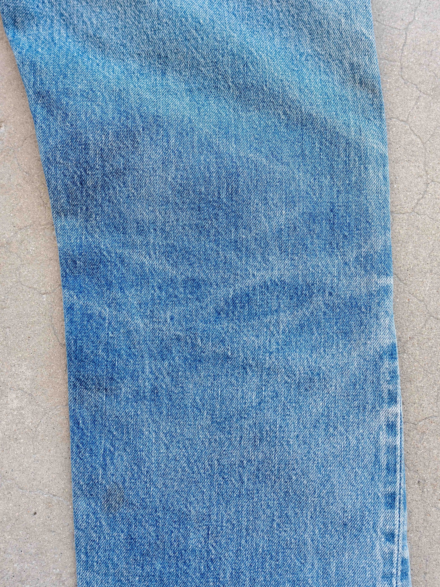 1980’s Levi’s 501 Redlines in a Light Midwash with Dirt and Rips 32W