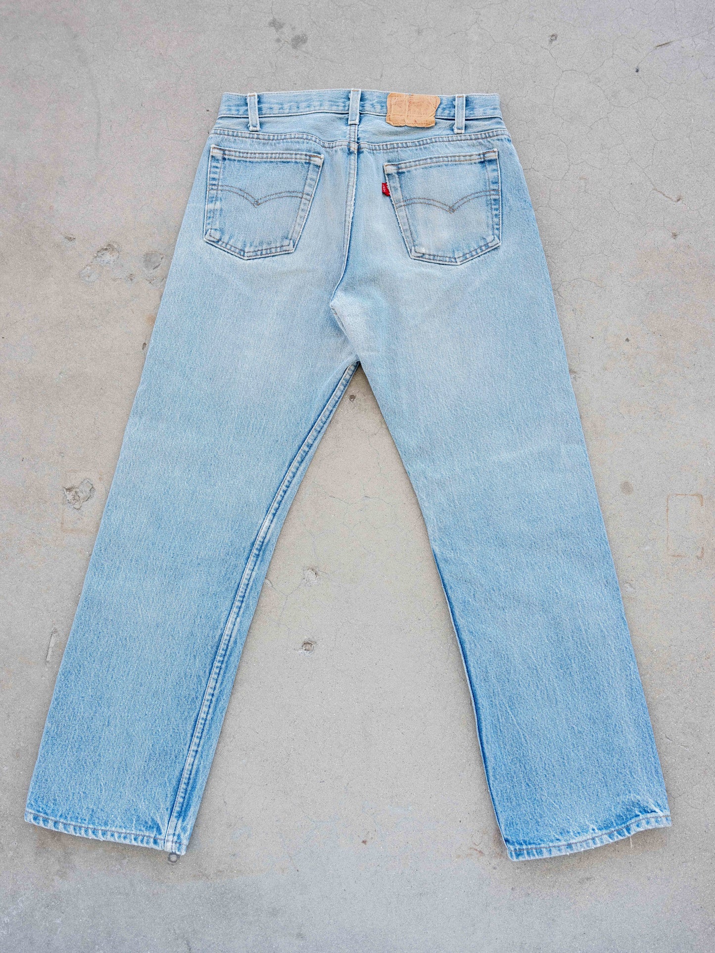 1980’s Levi’s 701 in a Light Midwash with Character 30W