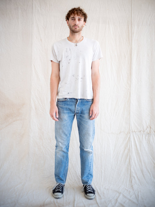 1980’s Levi’s 501 Redlines in a Light Midwash with Dirt and Rips 32W
