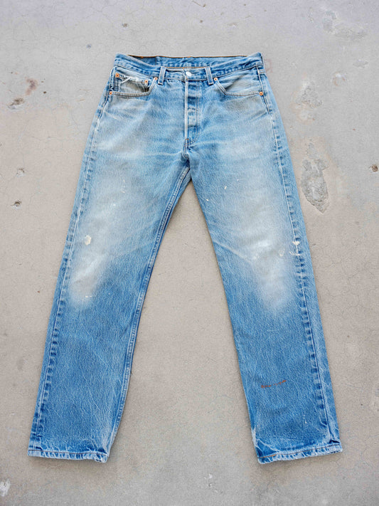 1990’s Levi’s 501s in a Light Mid Wash with Paint 32W