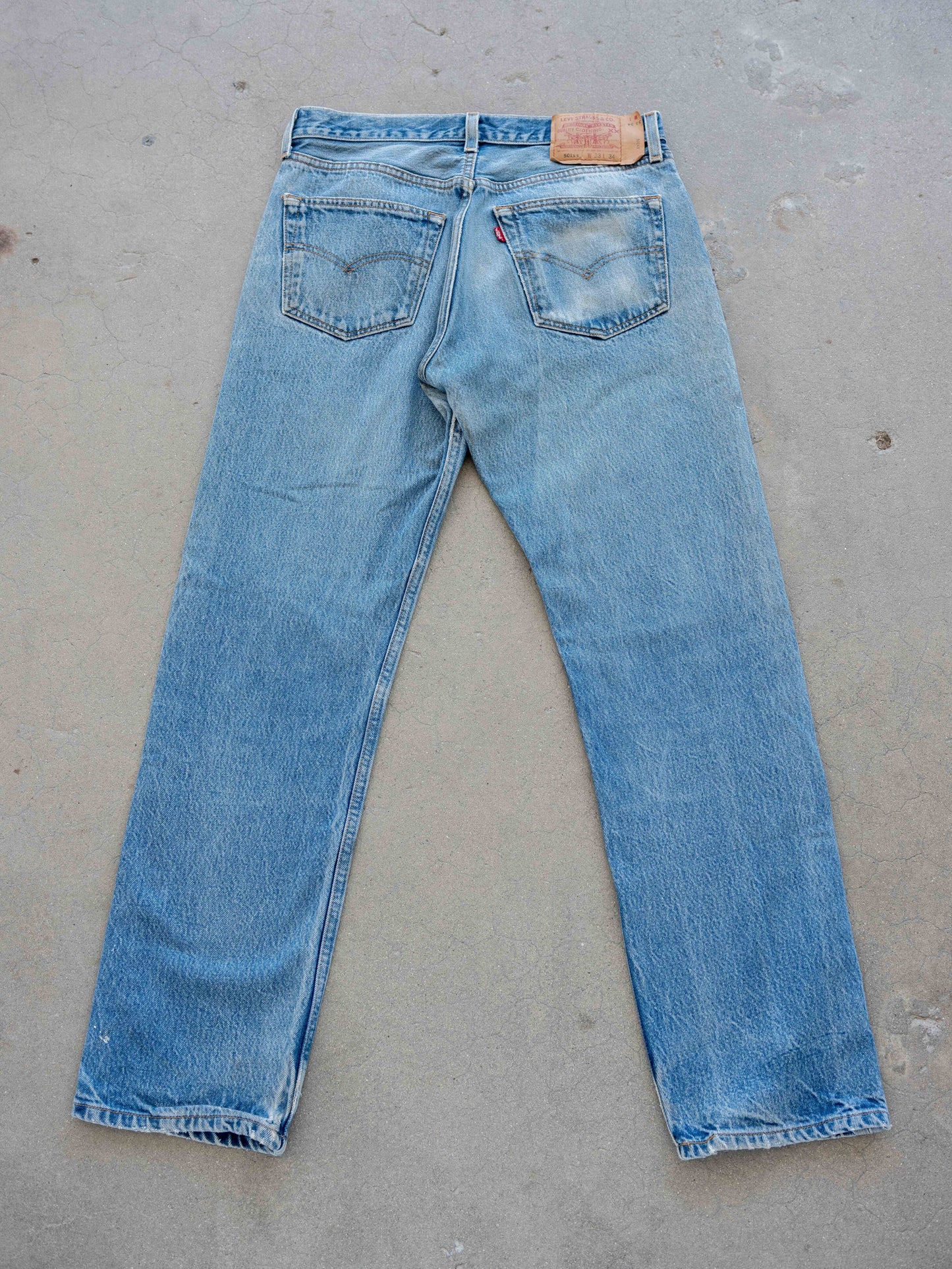1990’s Levi’s 501s in a Light Mid Wash with Paint 32W