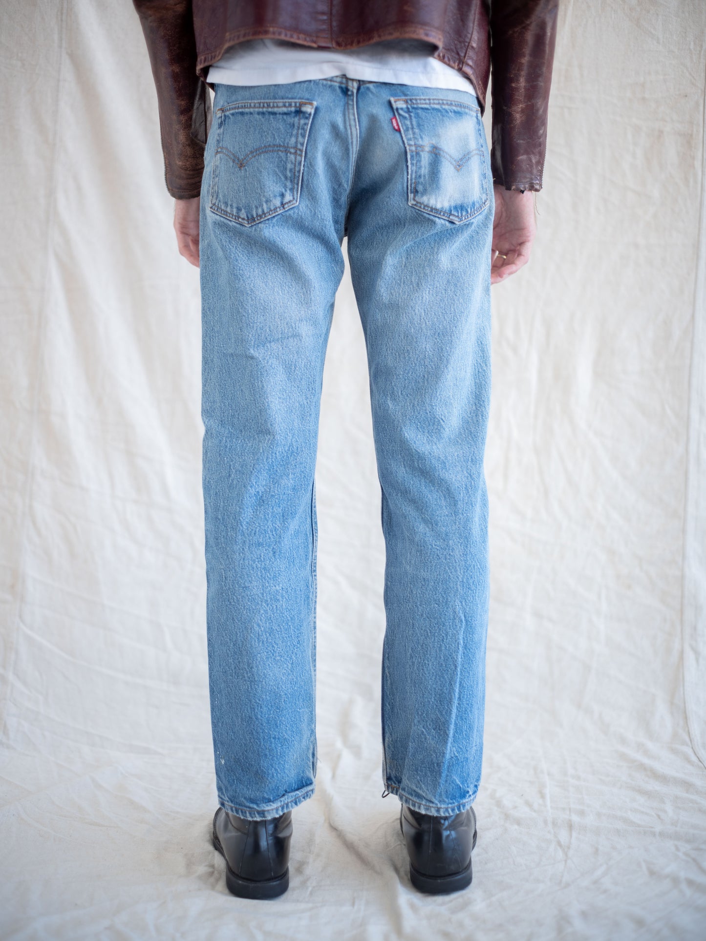 1990’s Levi’s 501s in a Light Mid Wash with Paint 32W