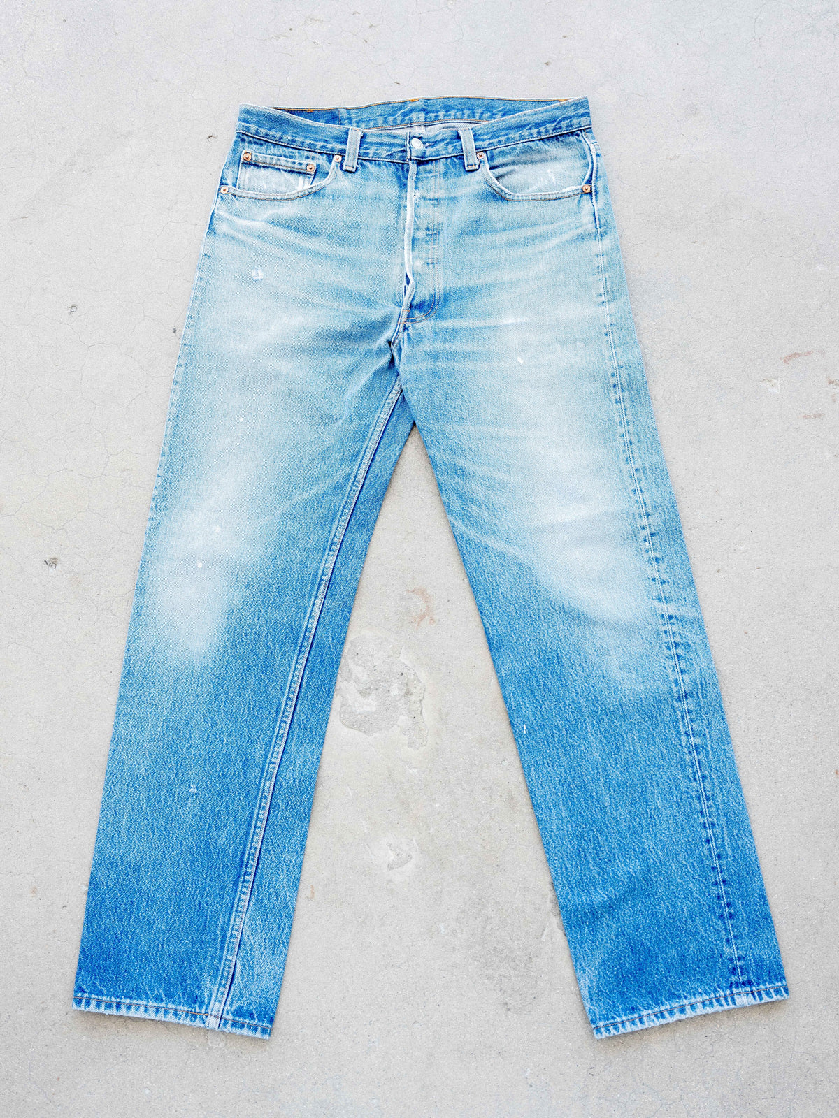 1980’s Levi’s 501s in a Light Midwash with Whiskering and Paint Drops 34W
