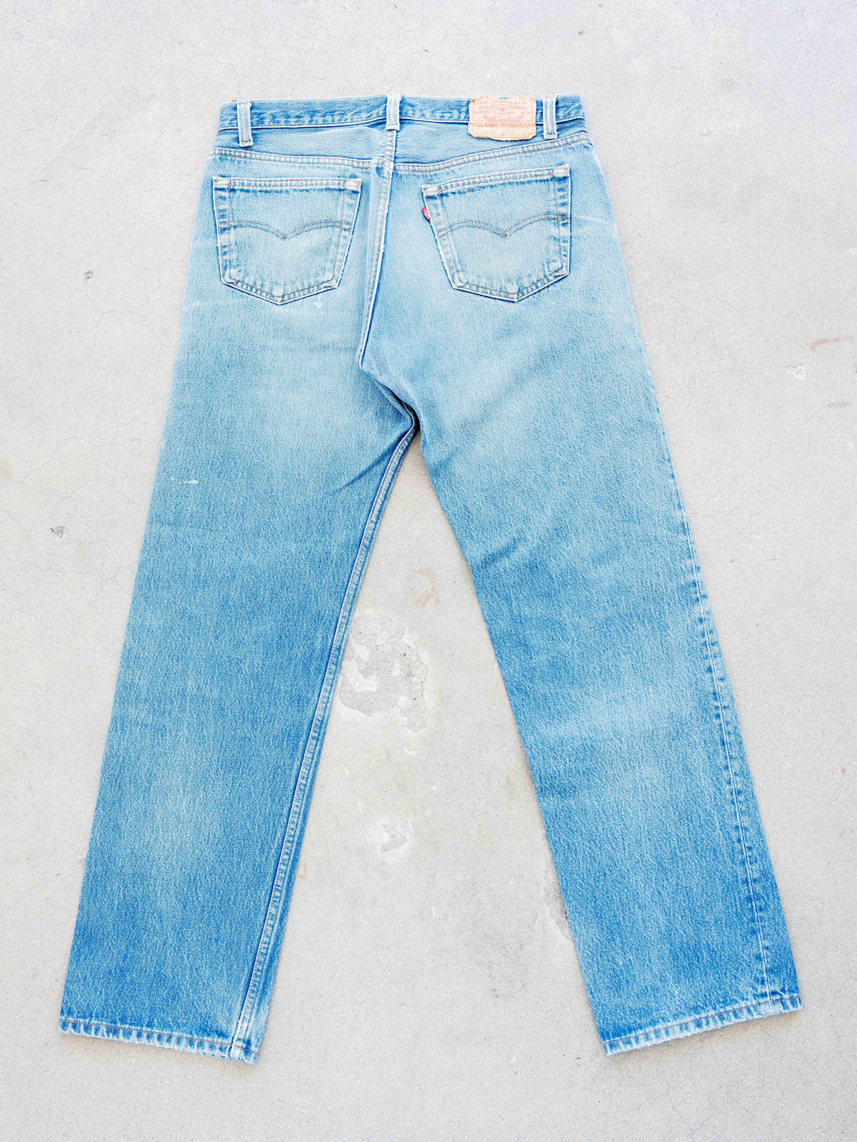 1980’s Levi’s 501s in a Light Midwash with Whiskering and Paint Drops 34W